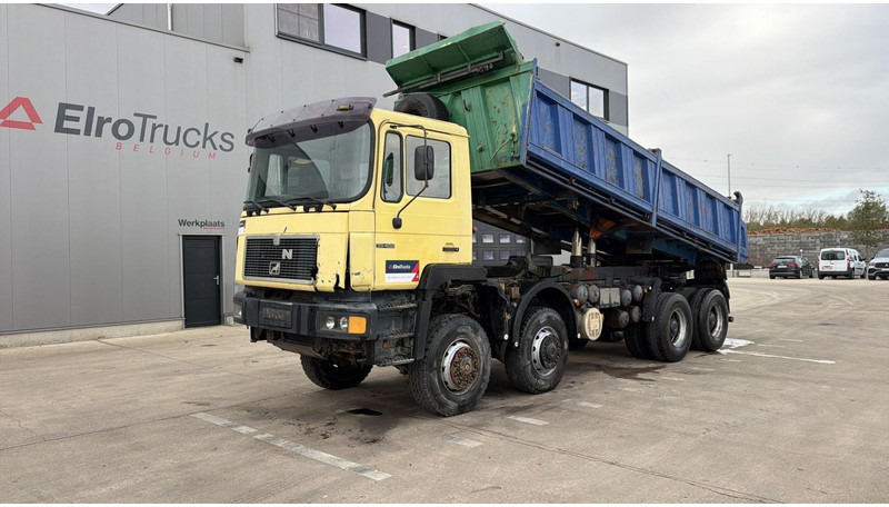 MAN 35.402 (8X8 / BIG AXLES / GRAND PONT / LAMES / STEEL SUSP. / 6 CYLINDER) - Camion benne: photos 1 MAN 35.402 (8X8 / BIG AXLES / GRAND PONT / LAMES / STEEL SUSP. / 6 CYLINDER) - Camion benne: photos 1