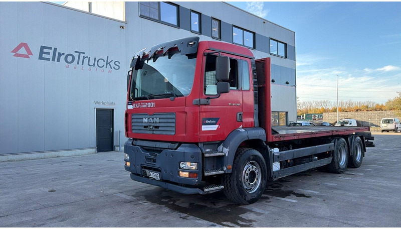 MAN TGA 26.360 (6X4 / STEEL SUSP / LAMES / MANUAL PUMP / BOITE MANUELLE / MANUAL GEARBOX) - Camion plateau: photos 1 MAN TGA 26.360 (6X4 / STEEL SUSP / LAMES / MANUAL PUMP / BOITE MANUELLE / MANUAL GEARBOX) - Camion plateau: photos 1