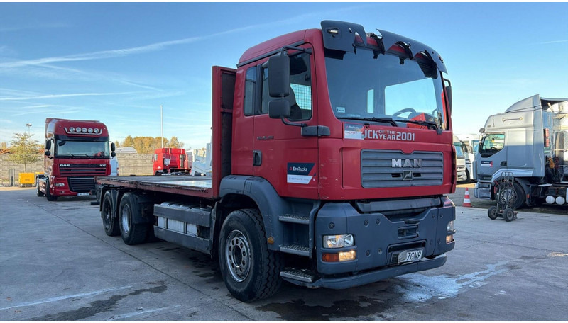 MAN TGA 26.360 (6X4 / STEEL SUSP / LAMES / MANUAL PUMP / BOITE MANUELLE / MANUAL GEARBOX) - Camion plateau: photos 2 MAN TGA 26.360 (6X4 / STEEL SUSP / LAMES / MANUAL PUMP / BOITE MANUELLE / MANUAL GEARBOX) - Camion plateau: photos 2