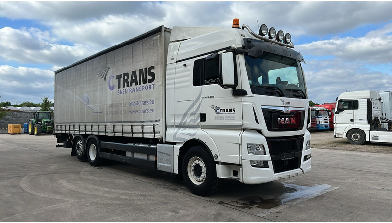 MAN TGX 26.400 (EURO 6 / 6X2 / LIFT / HAYON / BELGIAN TRUCK / GUTE ZUSTAND !! / 8.40 BOX LENGTH) - Camion à rideaux coulissants: photos 2 MAN TGX 26.400 (EURO 6 / 6X2 / LIFT / HAYON / BELGIAN TRUCK / GUTE ZUSTAND !! / 8.40 BOX LENGTH) - Camion à rideaux coulissants: photos 2