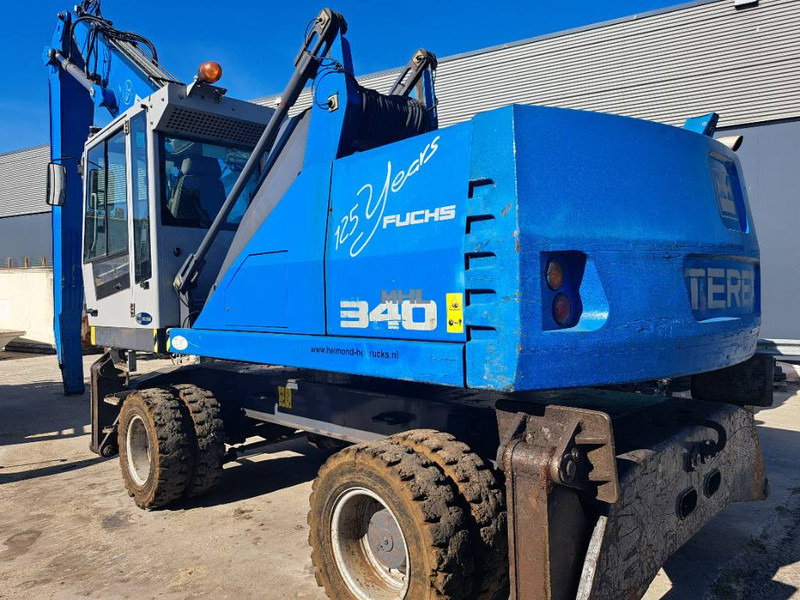 Fuchs MHL 340 D - Pelle de manutention: photos 1 Fuchs MHL 340 D - Pelle de manutention: photos 1