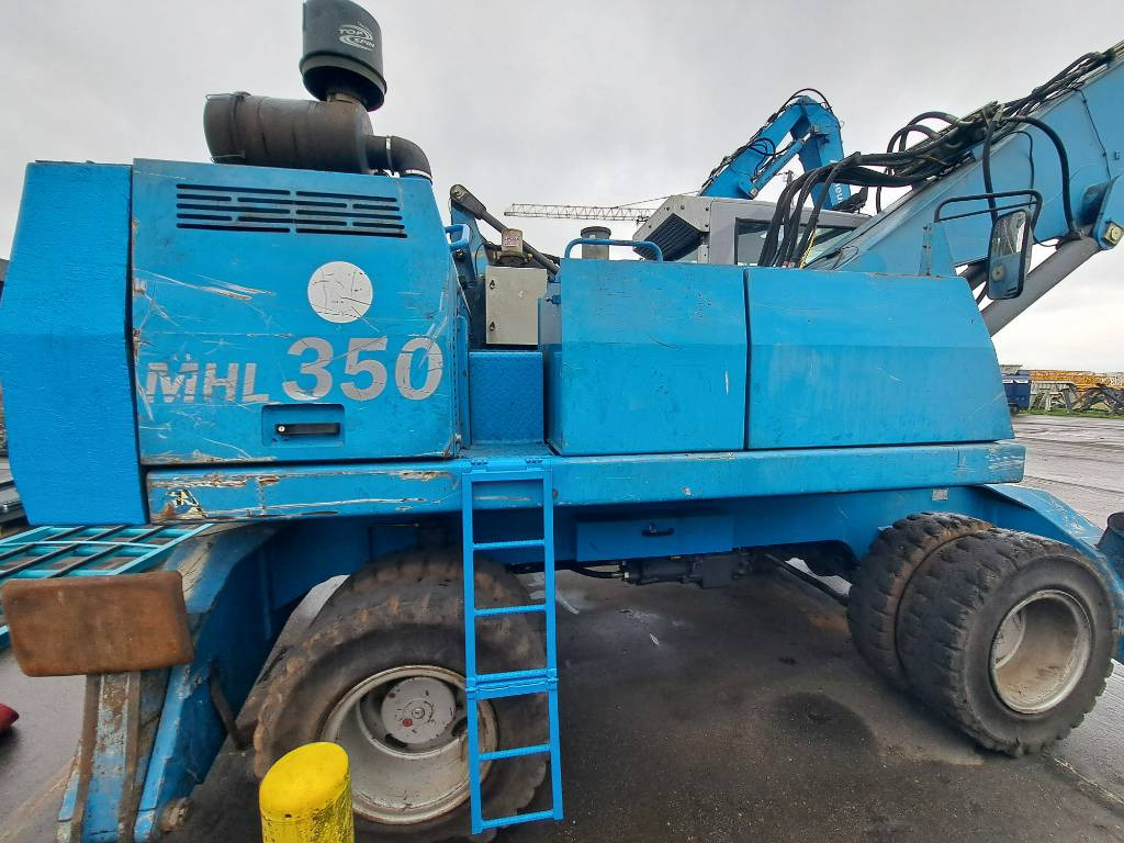 Pelle de manutention Fuchs MHL350C + generator: photos 7
