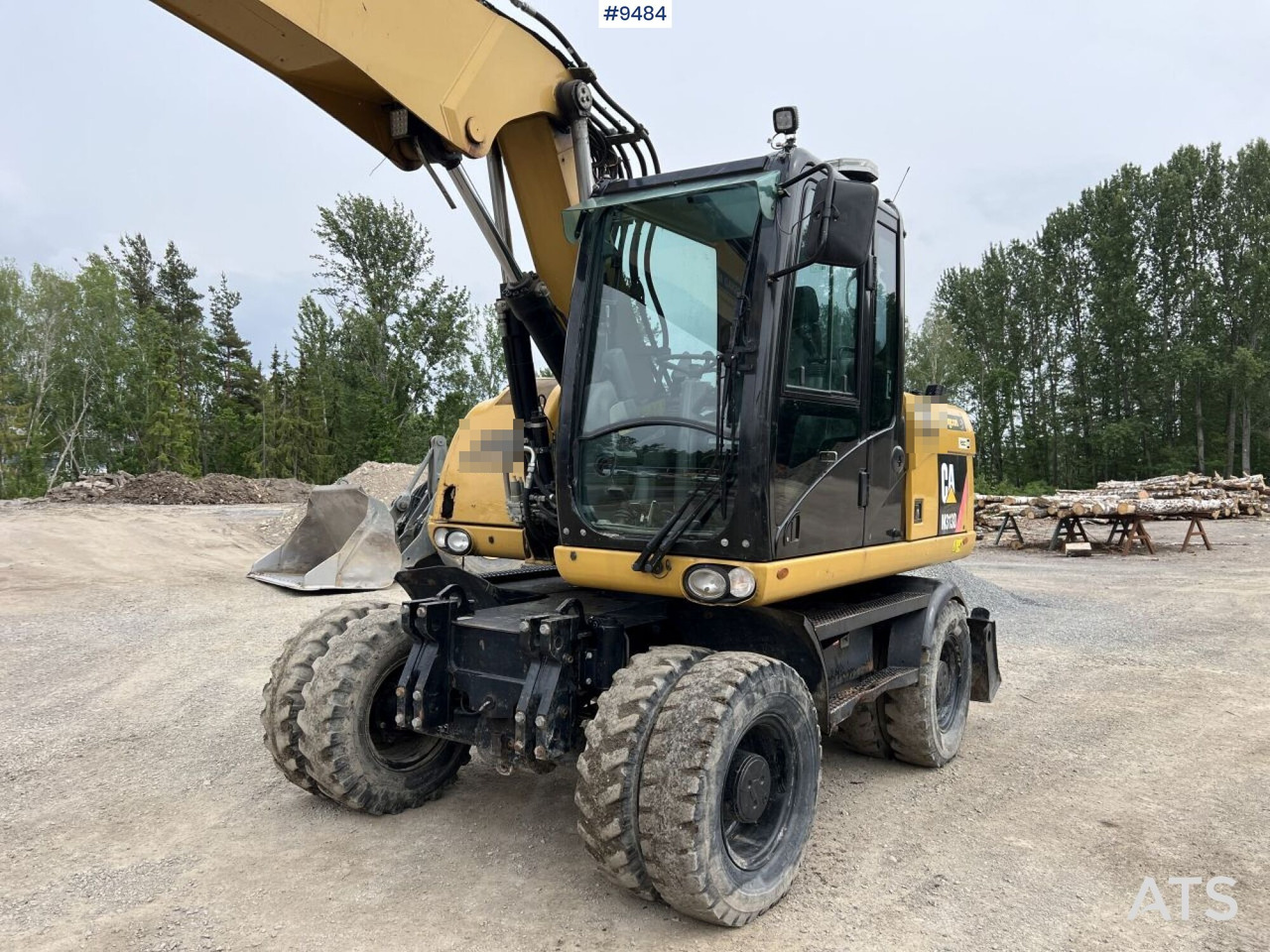 CAT M313D with tipping wagon and attachments (VIDEO) - Pelle sur pneus: photos 4 CAT M313D with tipping wagon and attachments (VIDEO) - Pelle sur pneus: photos 4