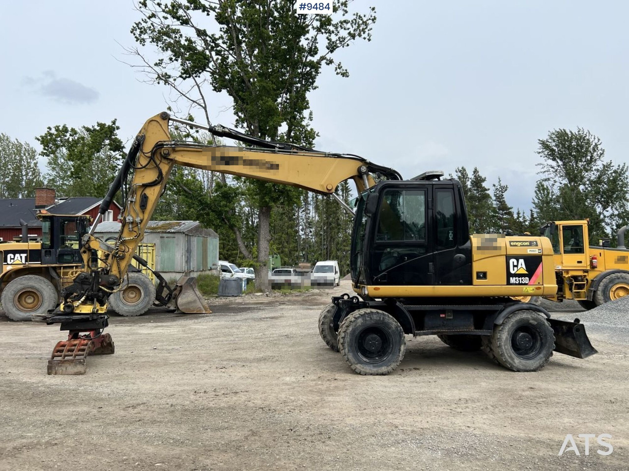 CAT M313D with tipping wagon and attachments (VIDEO) - Pelle sur pneus: photos 2 CAT M313D with tipping wagon and attachments (VIDEO) - Pelle sur pneus: photos 2
