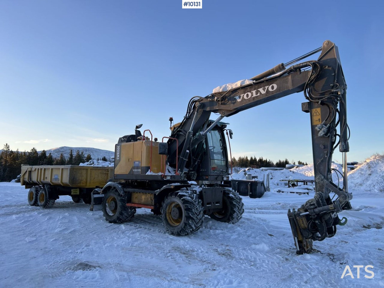 Wheel excavator Volvo EWR 150 with tipper and rotor - Pelle sur pneus: photos 2 Wheel excavator Volvo EWR 150 with tipper and rotor - Pelle sur pneus: photos 2