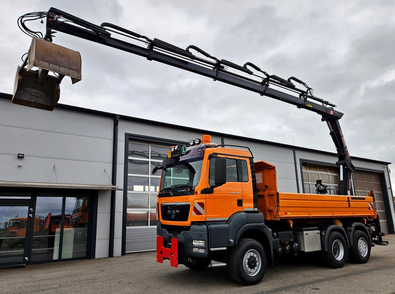 MAN TGS 28.360 6x4-4 HIAB 144E-4 Kran Euro5 - Camion benne, Camion grue: photos 1 MAN TGS 28.360 6x4-4 HIAB 144E-4 Kran Euro5 - Camion benne, Camion grue: photos 1