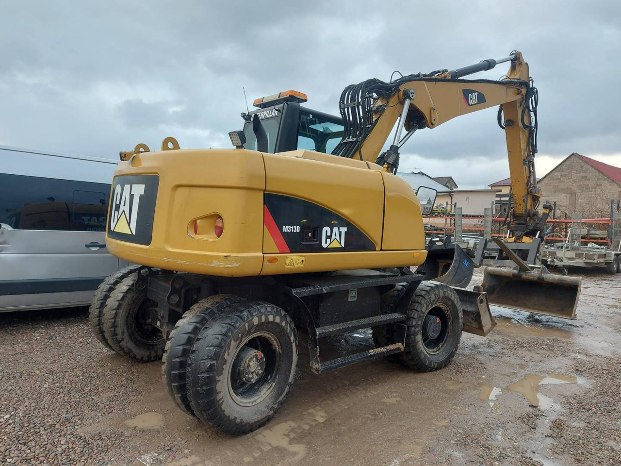 CAT M313D - Pelle sur pneus: photos 3 CAT M313D - Pelle sur pneus: photos 3