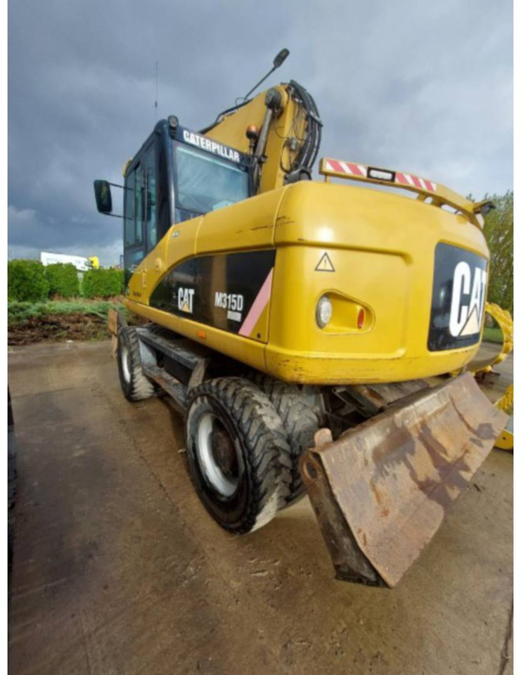 CAT M315D - Pelle sur pneus: photos 4 CAT M315D - Pelle sur pneus: photos 4
