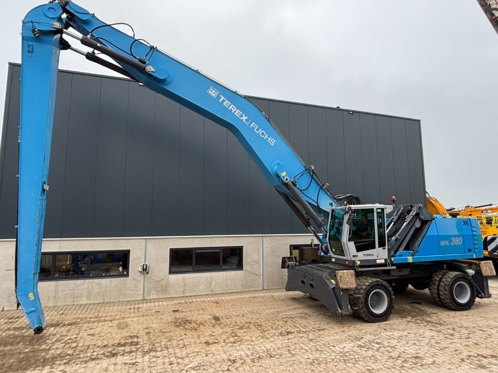 Fuchs MHL 380 -- only 6650 real working hours - Pelle de manutention: photos 1 Fuchs MHL 380 -- only 6650 real working hours - Pelle de manutention: photos 1