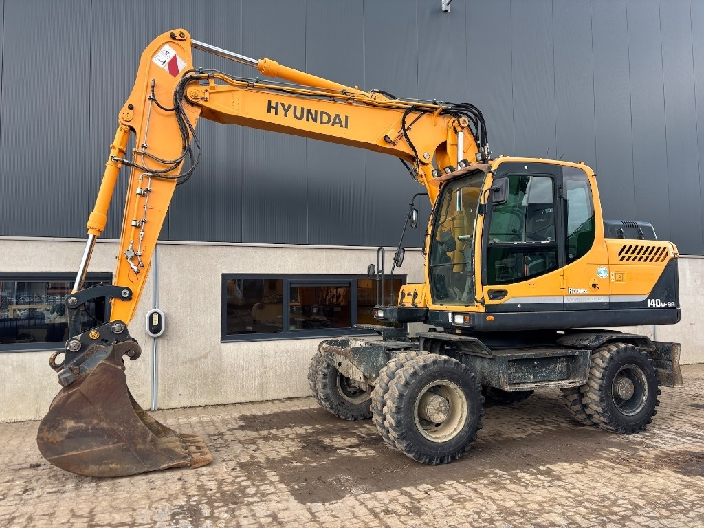 Pelle sur pneus Hyundai Robex 140 W-9 A - R140W-9A - 140W-9 - 140 W-9: photos 1