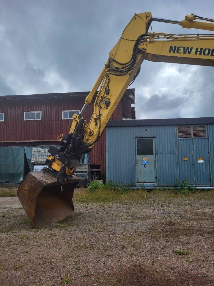 New Holland Kobelco E 235 B SR-2 - Pelle sur chenille: photos 4 New Holland Kobelco E 235 B SR-2 - Pelle sur chenille: photos 4