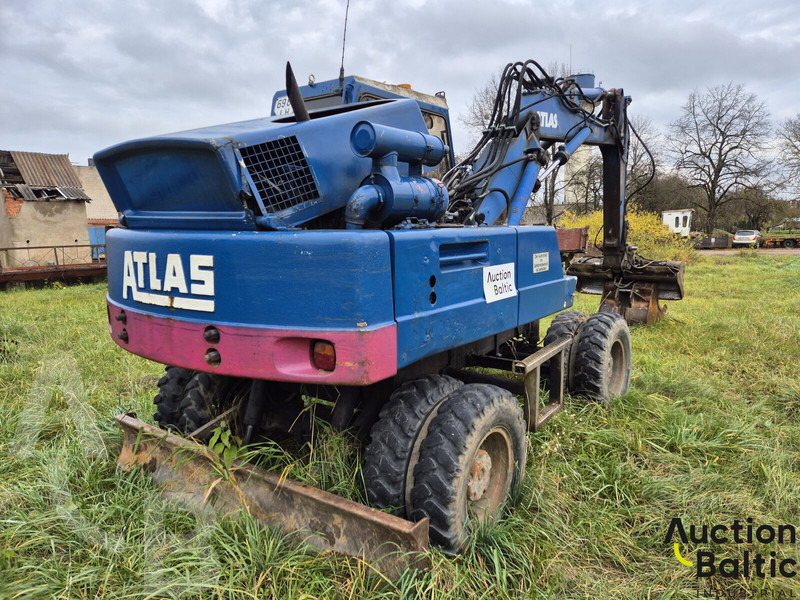 Atlas 1304 - Pelle sur pneus: photos 3 Atlas 1304 - Pelle sur pneus: photos 3