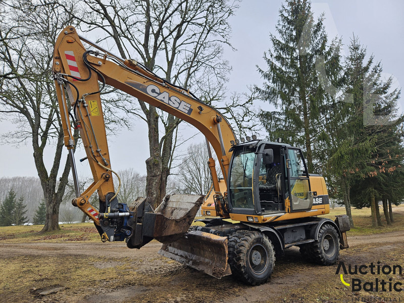 Case WX 165 - Pelle sur pneus: photos 1 Case WX 165 - Pelle sur pneus: photos 1