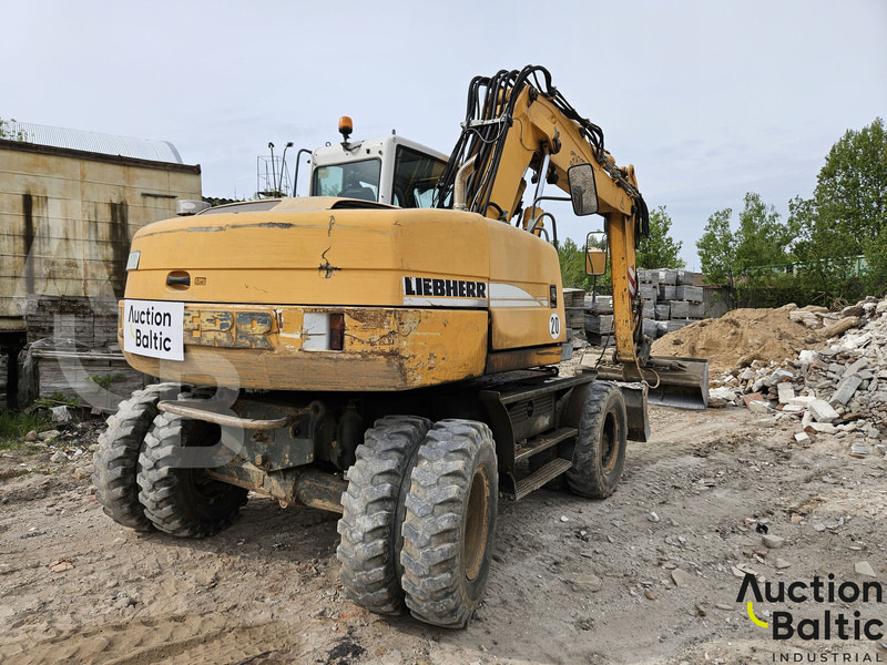 Liebherr A 316 Litronic - Pelle sur pneus: photos 3 Liebherr A 316 Litronic - Pelle sur pneus: photos 3