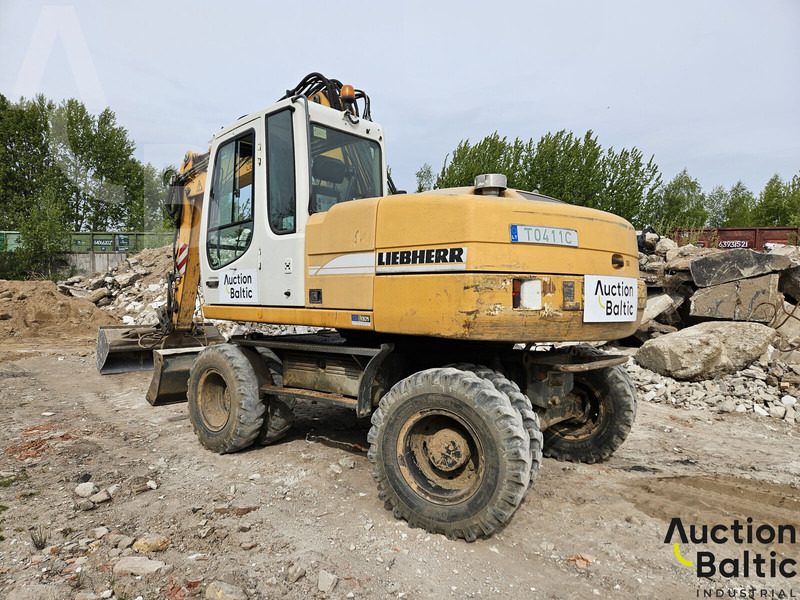 Liebherr A 316 Litronic - Pelle sur pneus: photos 4 Liebherr A 316 Litronic - Pelle sur pneus: photos 4