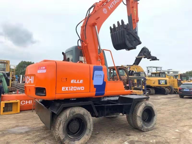HITACHI EX120WD - Pelle sur pneus: photos 1 HITACHI EX120WD - Pelle sur pneus: photos 1