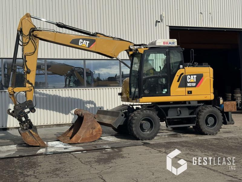Caterpillar M315F - Pelle sur pneus: photos 1 Caterpillar M315F - Pelle sur pneus: photos 1