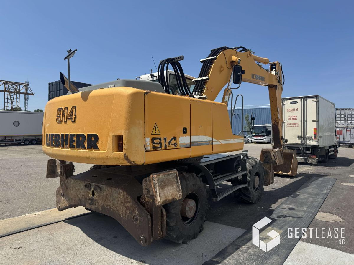Liebherr A 914 C Litronic - Pelle sur pneus: photos 3 Liebherr A 914 C Litronic - Pelle sur pneus: photos 3