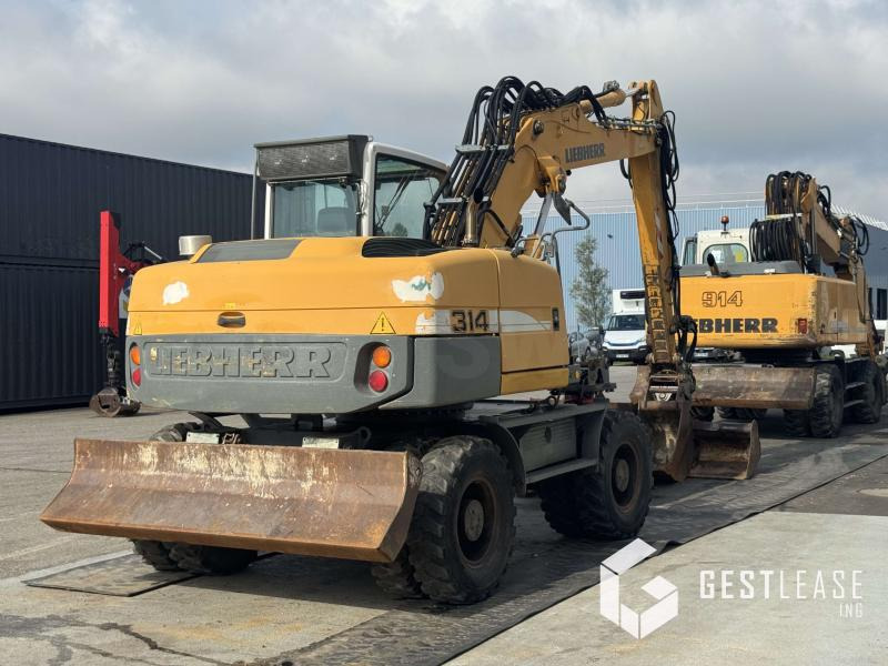 Liebherr A314 Litronic - Pelle sur pneus: photos 4 Liebherr A314 Litronic - Pelle sur pneus: photos 4