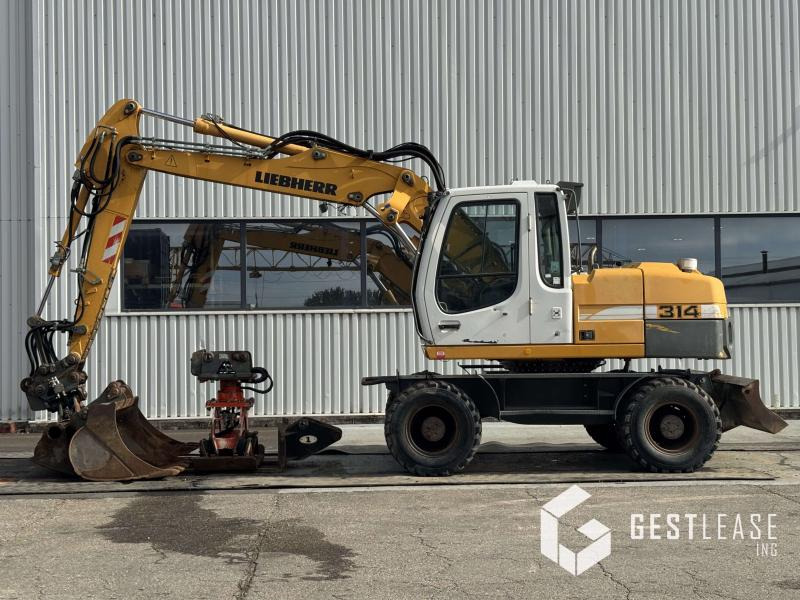 Liebherr A314 Litronic - Pelle sur pneus: photos 2 Liebherr A314 Litronic - Pelle sur pneus: photos 2