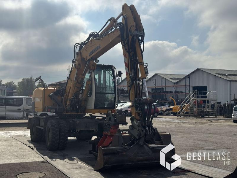 Liebherr A314 Litronic - Pelle sur pneus: photos 5 Liebherr A314 Litronic - Pelle sur pneus: photos 5
