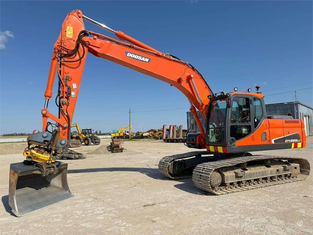 Doosan DX 225 LC ENGCON ROTOTILT TOP - Pelle sur chenille: photos 1 Doosan DX 225 LC ENGCON ROTOTILT TOP - Pelle sur chenille: photos 1