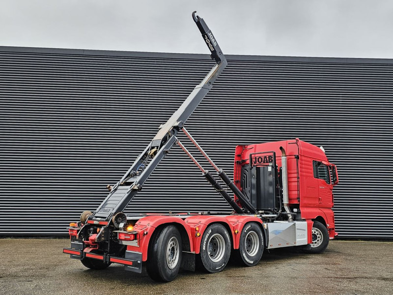 MAN TGX 35.500 / 8x4-4 / ABROLL-KIPPER / HOOKLIFT - Camion ampliroll: photos 4 MAN TGX 35.500 / 8x4-4 / ABROLL-KIPPER / HOOKLIFT - Camion ampliroll: photos 4