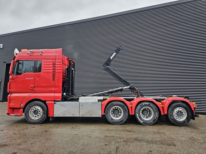 MAN TGX 35.500 / 8x4-4 / ABROLL-KIPPER / HOOKLIFT - Camion ampliroll: photos 2 MAN TGX 35.500 / 8x4-4 / ABROLL-KIPPER / HOOKLIFT - Camion ampliroll: photos 2