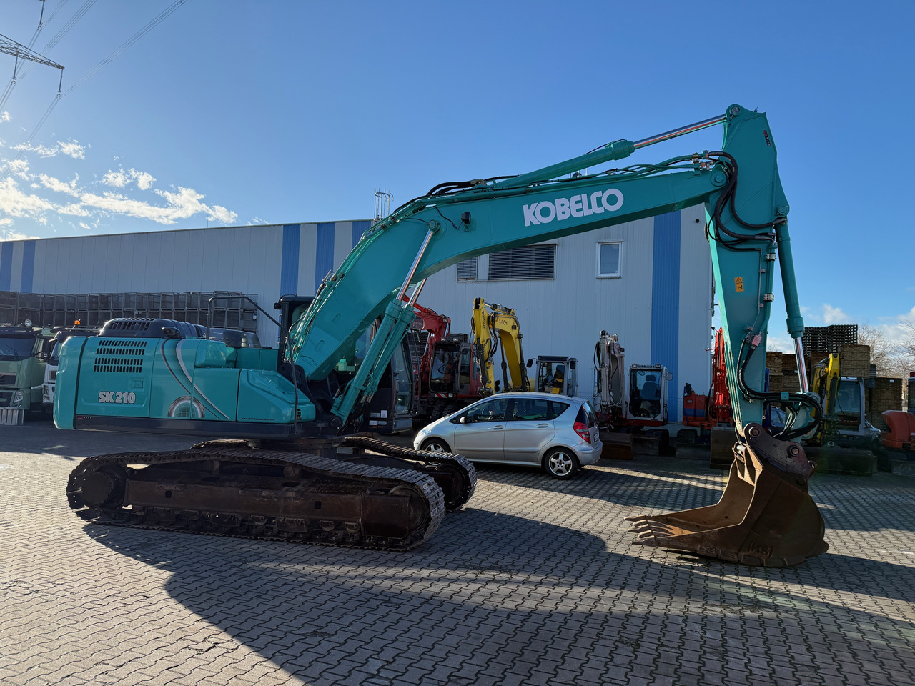 Kobelco SK210 NLC-10 Kettenbagger Oilquick Klima - Pelle sur chenille: photos 3 Kobelco SK210 NLC-10 Kettenbagger Oilquick Klima - Pelle sur chenille: photos 3