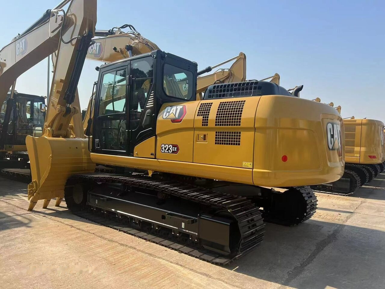 Caterpillar 323GX - Pelle sur chenille: photos 1 Caterpillar 323GX - Pelle sur chenille: photos 1