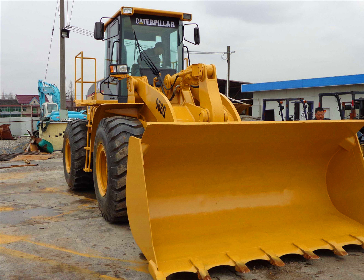 Caterpillar 966G - Chargeuse sur pneus: photos 1 Caterpillar 966G - Chargeuse sur pneus: photos 1