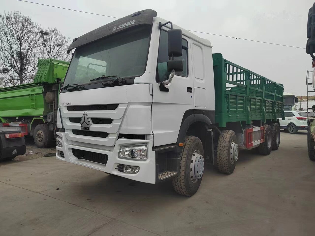 Sinotruk HOWO 8*4 Fence Truck - Camion plateau: photos 1 Sinotruk HOWO 8*4 Fence Truck - Camion plateau: photos 1