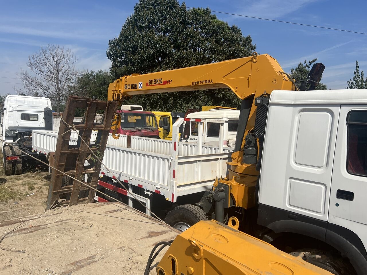 XCMG SQ12SK3Q Selfloader Truck - Grue auxiliaire: photos 1 XCMG SQ12SK3Q Selfloader Truck - Grue auxiliaire: photos 1