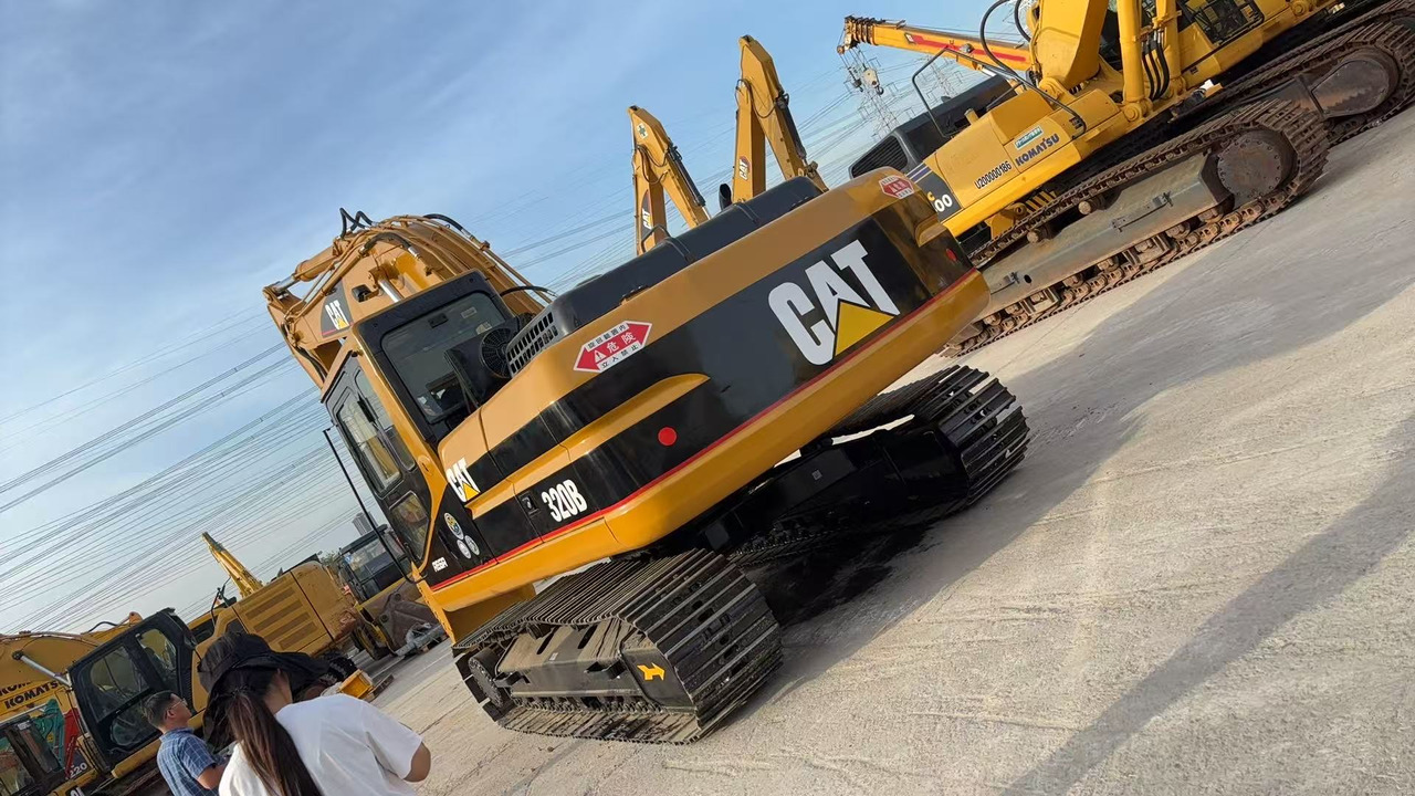CAT 320BL - Pelle sur chenille: photos 1 CAT 320BL - Pelle sur chenille: photos 1