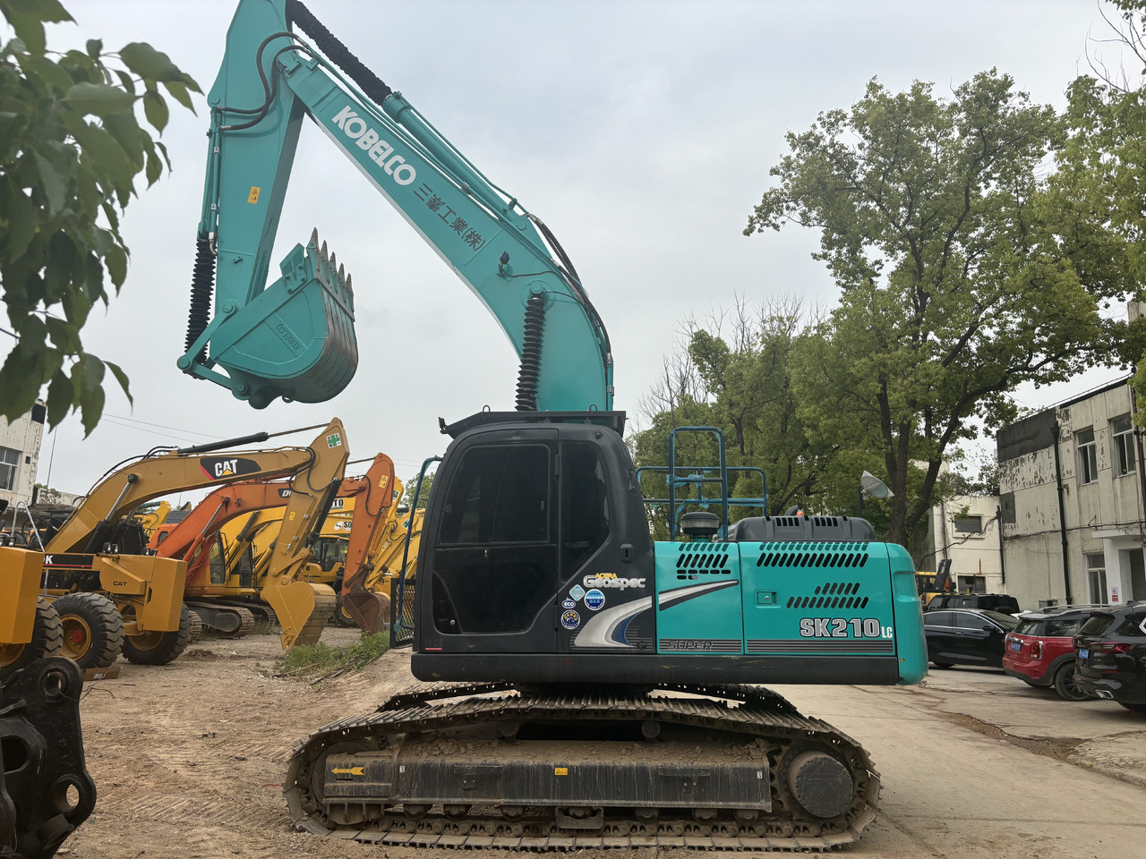 KOBELCO SK 210 LC - Pelle sur chenille: photos 1 KOBELCO SK 210 LC - Pelle sur chenille: photos 1