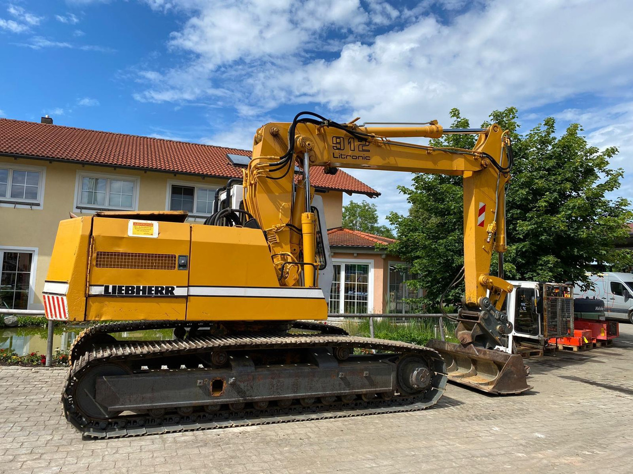 Liebherr R 912 LIT - Pelle sur chenille: photos 1 Liebherr R 912 LIT - Pelle sur chenille: photos 1