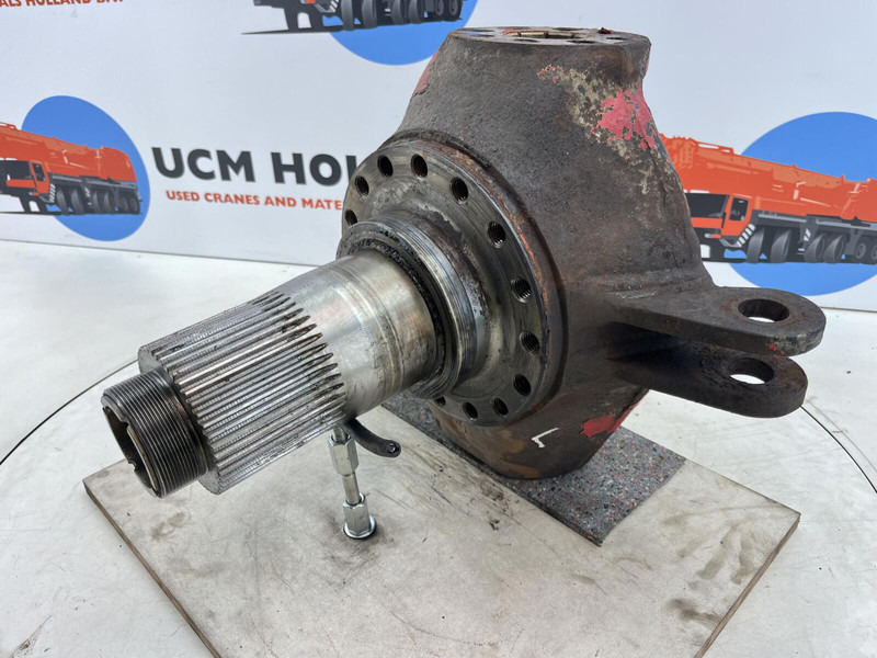 Terex Terex Demag AC 35 Steering knuckle 16 holes axle 2 left - Fusée d'essieu pour Grue: photos 1 Terex Terex Demag AC 35 Steering knuckle 16 holes axle 2 left - Fusée d'essieu pour Grue: photos 1