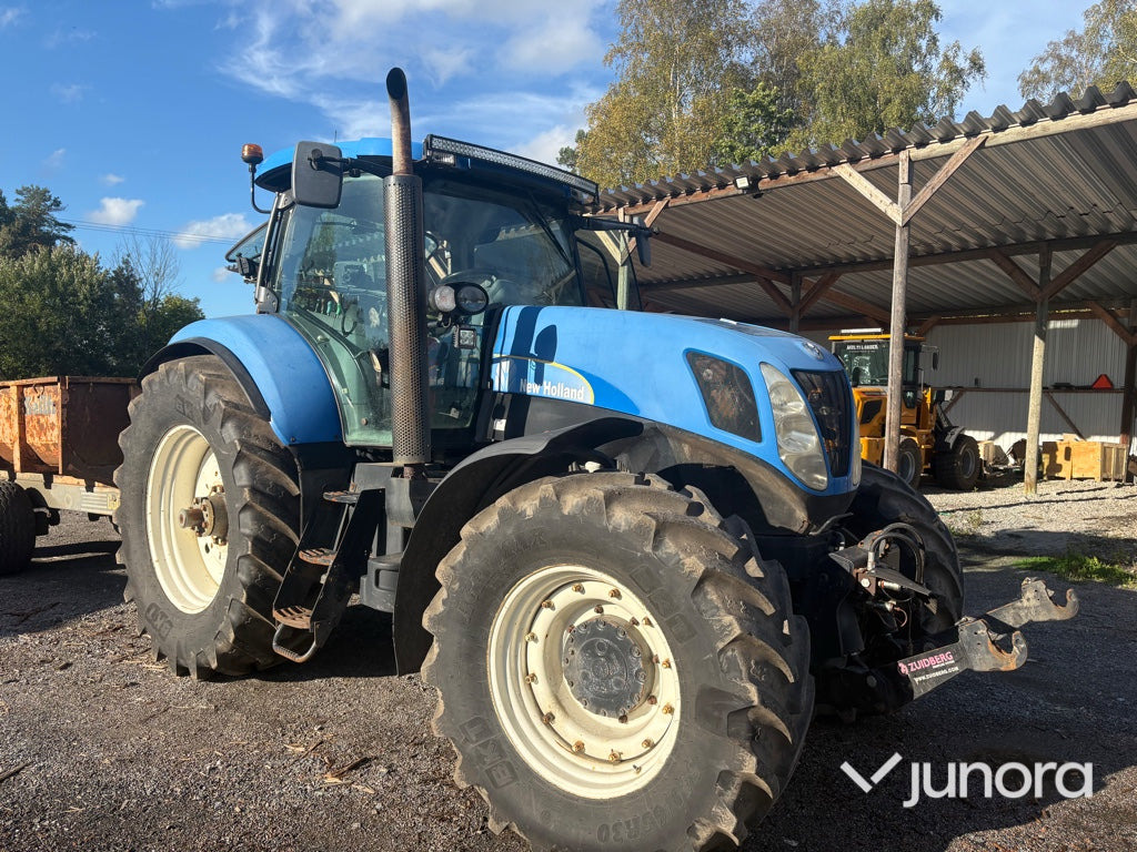 Traktor - New Holland, T7040 - Tracteur agricole: photos 1 Traktor - New Holland, T7040 - Tracteur agricole: photos 1