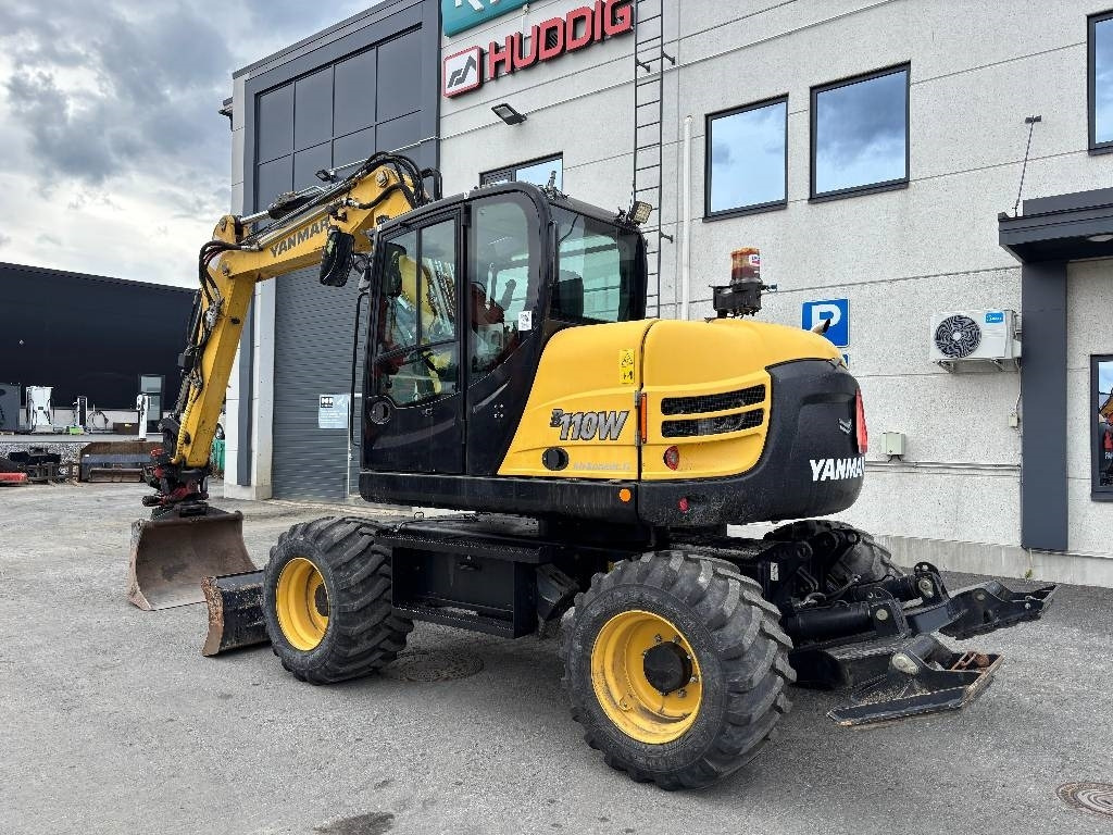 Yanmar B110W PYÖRITTÄJÄLLÄ - Pelle sur pneus: photos 2 Yanmar B110W PYÖRITTÄJÄLLÄ - Pelle sur pneus: photos 2