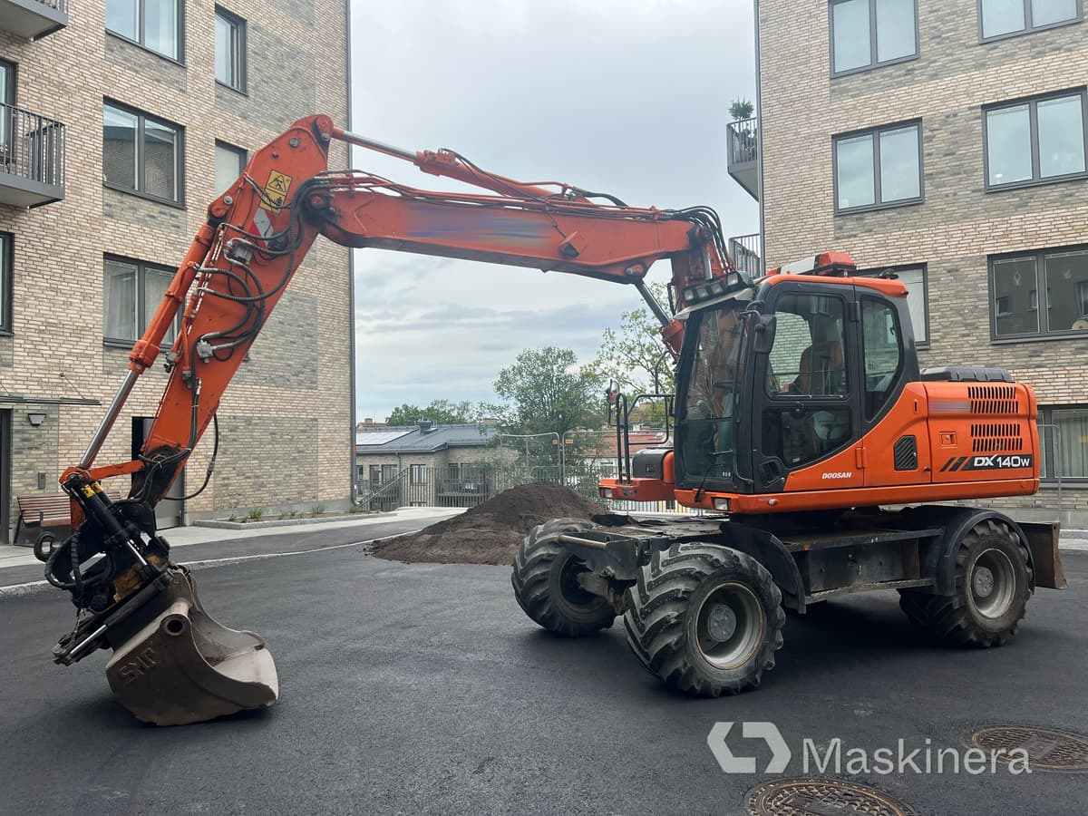 Hjugrävare Doosan DX140-3 - Pelle sur chenille: photos 1 Hjugrävare Doosan DX140-3 - Pelle sur chenille: photos 1