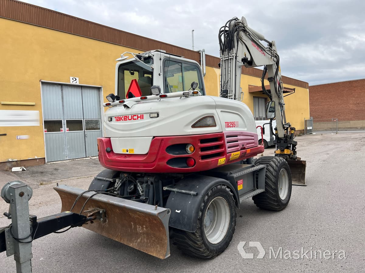 Pelle sur chenille Hjulgrävare Takeuchi TB295W med vagn & redskap: photos 11