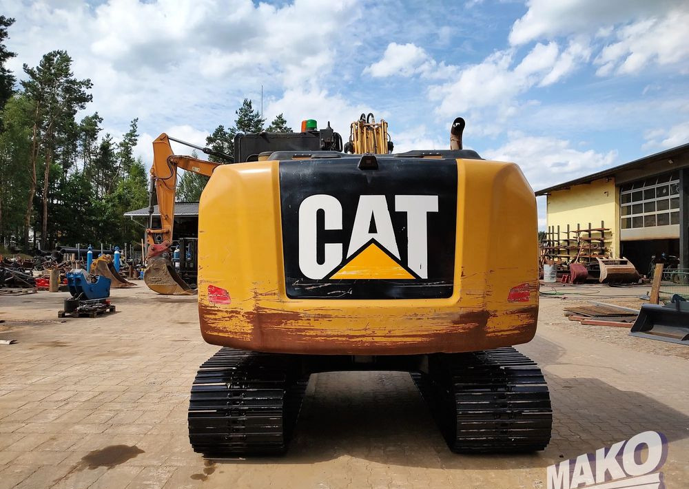 Caterpillar 312 E - Pelle sur chenille: photos 3 Caterpillar 312 E - Pelle sur chenille: photos 3