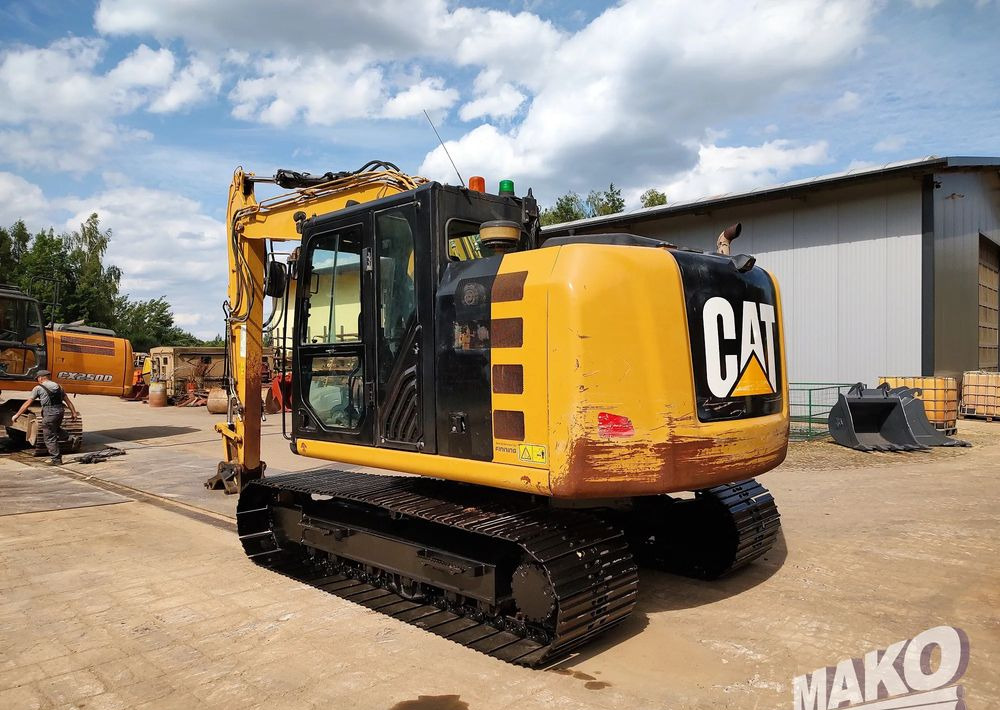Caterpillar 312 E - Pelle sur chenille: photos 2 Caterpillar 312 E - Pelle sur chenille: photos 2
