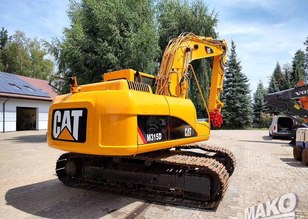 Caterpillar 315D - Pelle sur chenille: photos 5 Caterpillar 315D - Pelle sur chenille: photos 5