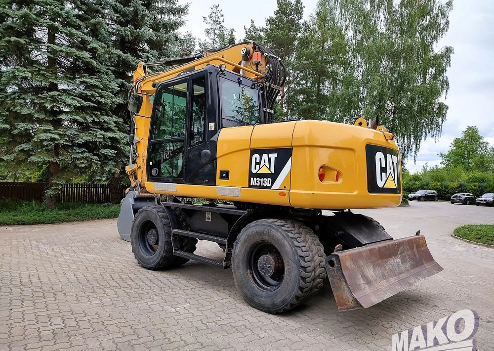 Caterpillar M313D - Pelle sur pneus: photos 2 Caterpillar M313D - Pelle sur pneus: photos 2