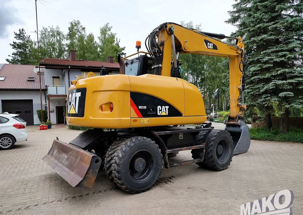 Caterpillar M313D - Pelle sur pneus: photos 4 Caterpillar M313D - Pelle sur pneus: photos 4