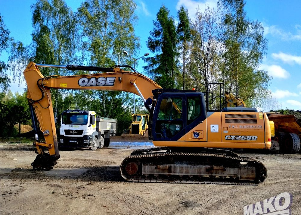 Komatsu CX 250 D - Pelle sur chenille: photos 1 Komatsu CX 250 D - Pelle sur chenille: photos 1