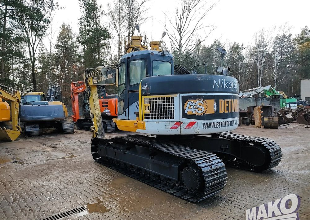 Komatsu PC228USLC-3 - Pelle sur chenille: photos 2 Komatsu PC228USLC-3 - Pelle sur chenille: photos 2