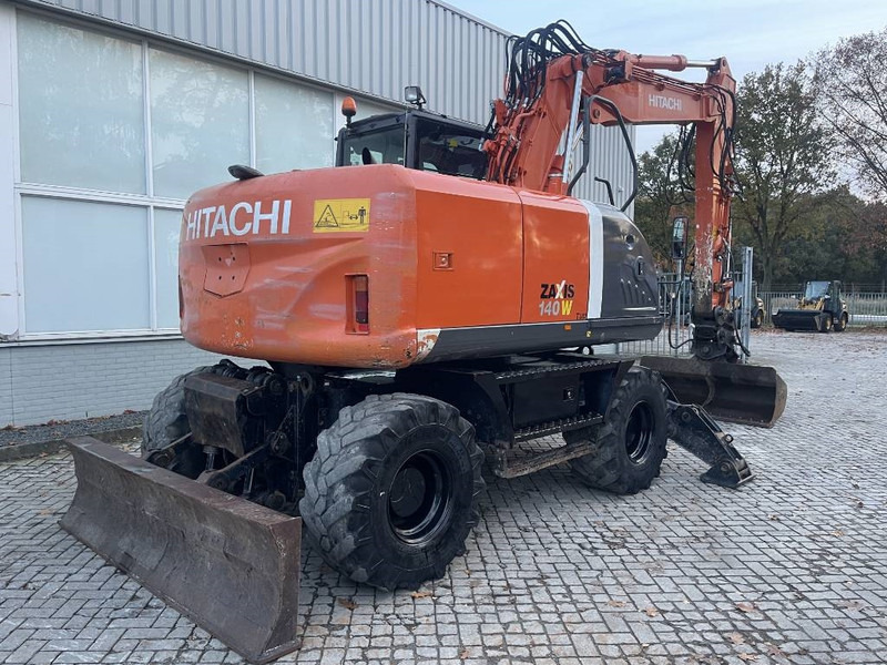 Pelle sur pneus Hitachi ZX 140 W-3: photos 6 Pelle sur pneus Hitachi ZX 140 W-3: photos 6