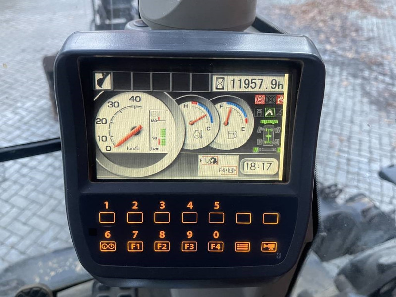 Pelle sur pneus Hitachi ZX 140 W-3: photos 14 Pelle sur pneus Hitachi ZX 140 W-3: photos 14